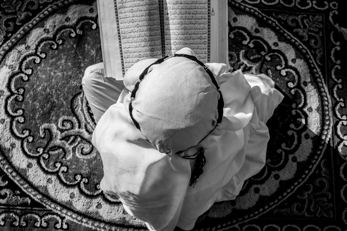 Young boy reading Quran, online Quran class for children $10/hr